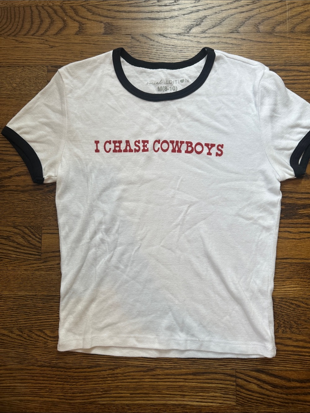 White Ringer Tee with Red 'I CHASE COWBOYS' Text
Note: hardly worn